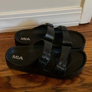 Black buckle slide sandal